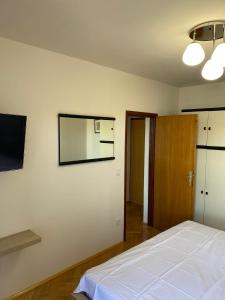 Ein Bett oder Betten in einem Zimmer der Unterkunft Apartment Ivan