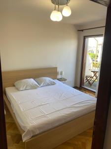 Ein Bett oder Betten in einem Zimmer der Unterkunft Apartment Ivan