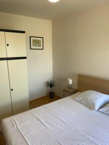 Ein Bett oder Betten in einem Zimmer der Unterkunft Apartment Ivan