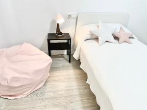 Posteľ alebo postele v izbe v ubytovaní Apartamento en Ametlla de Mar SEA VIEW HAUS FREE WIFI