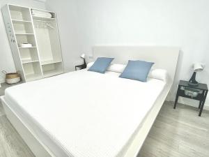 Posteľ alebo postele v izbe v ubytovaní Apartamento en Ametlla de Mar SEA VIEW HAUS FREE WIFI