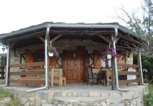a pavilion with a table and a tableablish at Mountain House Kastro in Kástron