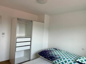 Postel nebo postele na pokoji v ubytování Chambres & Suites Villa architecte