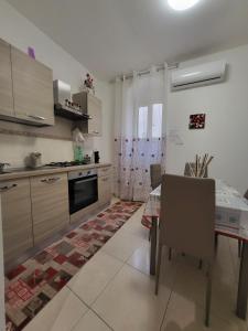Η κουζίνα ή μικρή κουζίνα στο Casa Giulia & AL Duomo