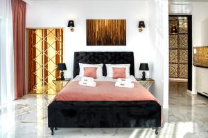 Katil atau katil-katil dalam bilik di Royal View Apartments · Dune Resort Łeba