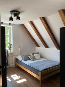 Posteľ alebo postele v izbe v ubytovaní ARSENAL apartment CITY CENTER Wrocław