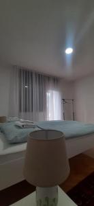 Giường trong phòng chung tại IKA-M +4 ảnh