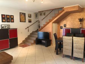TV a/nebo společenská místnost v ubytování Casa di Taty - Home resort