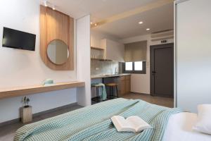 Kuchyň nebo kuchyňský kout v ubytování Asteras Hotel + 30 fotografií