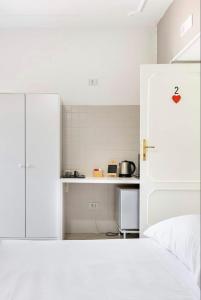 Posteľ alebo postele v izbe v ubytovaní B&B Civico 8