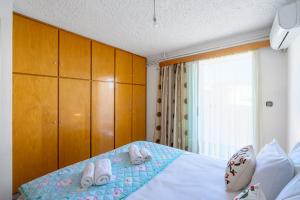 Postel nebo postele na pokoji v ubytování Cozy apartment