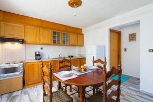 Kuchyň nebo kuchyňský kout v ubytování Cozy apartment + 16 fotografií