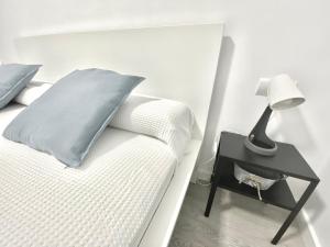 Posteľ alebo postele v izbe v ubytovaní Apartamento en Ametlla de Mar SEA VIEW HAUS FREE WIFI