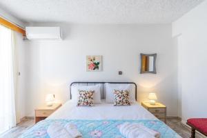 Postel nebo postele na pokoji v ubytování Cozy apartment