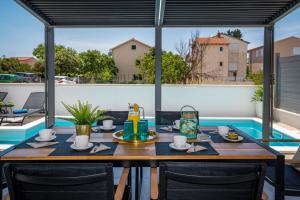 Bazén v ubytovaní VILLA PRESTIGE alebo v jeho blízkosti