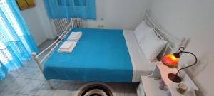 Postel nebo postele na pokoji v ubytování Thanasis' apartments Α2