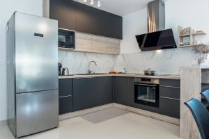 Kuchyňa alebo kuchynka v ubytovaní VILLA PRESTIGE