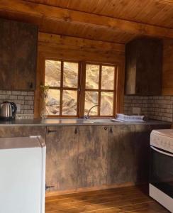 Kuchyň nebo kuchyňský kout v ubytování Bosco Paradiso