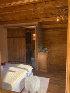 Postel nebo postele na pokoji v ubytování Bosco Paradiso