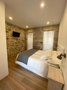 Postel nebo postele na pokoji v ubytování Casa Real 43