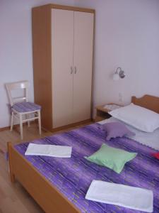 Postel nebo postele na pokoji v ubytování ADRIA