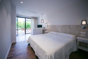 Cama o camas de una habitación en Hotel Rural El Molino de Felipe