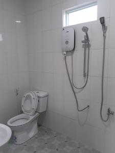 Koupelna v ubytování Nguyet Que Homestay & Tours