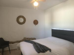 Łóżko lub łóżka w pokoju w obiekcie Casa Lumbreras