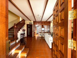a hallway of a home with a living room at Villas el Alto in Moya