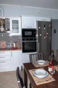 A kitchen or kitchenette at Agis home