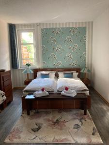 En eller flere senge i et værelse på Villa Irene am Inselsee
