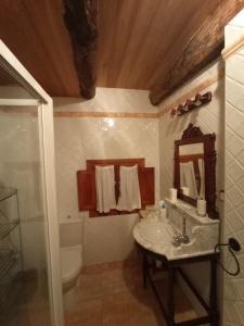 Ett badrum på Casa de Abril 2