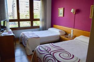 Posteľ alebo postele v izbe v ubytovaní Pension Payvi