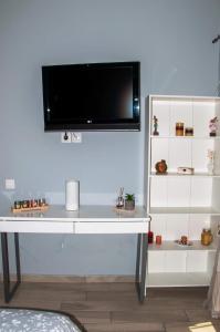 A television and/or entertainment centre at Agis home