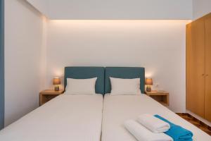 Posteľ alebo postele v izbe v ubytovaní Hermes Beach Front