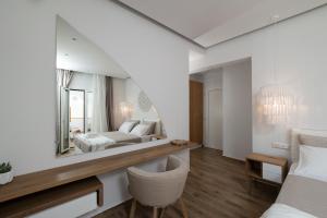 Posteľ alebo postele v izbe v ubytovaní Naxian Memories Apartments