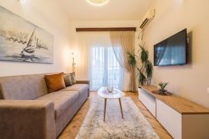 TV a/nebo společenská místnost v ubytování Villa Oleander