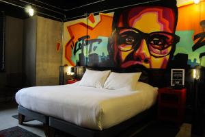 Postel nebo postele na pokoji v ubytování LOFT Hotel by Sommelier Hoteles