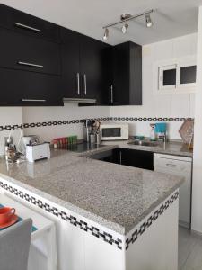 A kitchen or kitchenette at Jupiter 907 im Costa del Sol