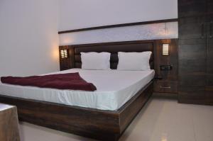 Posteľ alebo postele v izbe v ubytovaní The Great Anjali Mahal