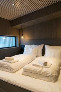 Postel nebo postele na pokoji v ubytování Lofoten Apartments