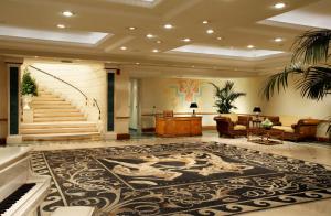 Posedenie v ubytovaní Royal Olympic Hotel
