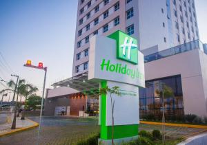 a hotel sign in front of a building at Holiday Inn Natal, an IHG Hotel in Natal