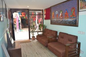 Area soggiorno di Bag Packer's Lodge