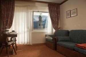Гостиная зона в Hotel Alaska Cortina