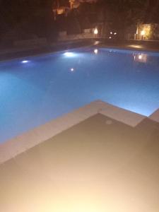 The swimming pool at or close to La luna house