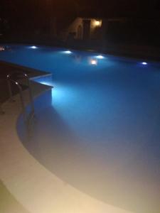 The swimming pool at or close to La luna house