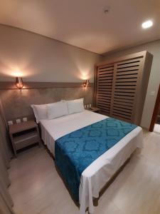 Cama o camas de una habitación en Ilhéus North Residence