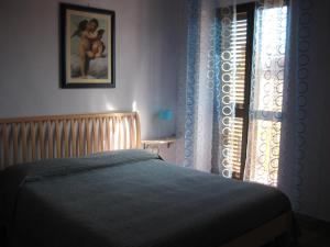 Postel nebo postele na pokoji v ubytování Sa Domo de Minnanna