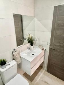 A bathroom at ISLAND SUITES